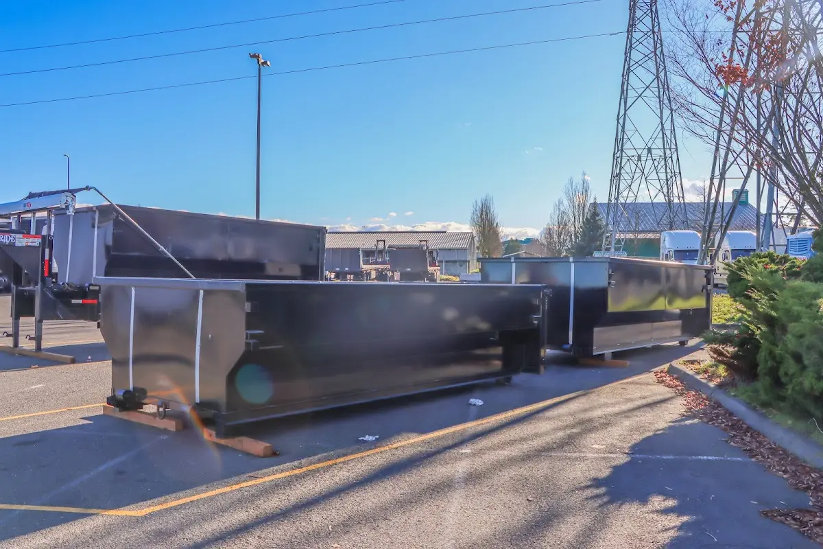 Roll-off dumpster ready for waste disposal at job site for 2 Yard Dumpster Rental in Key Biscayne